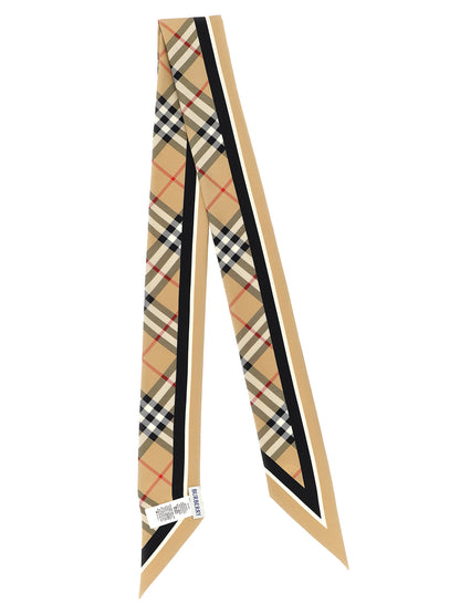 Scarf by Burberry for women in silk satin beige showcases a eye catching silhouette, artfully capturing the essence of the eye catching Silk Satin Foulard Scarf design for a sophisticated look.