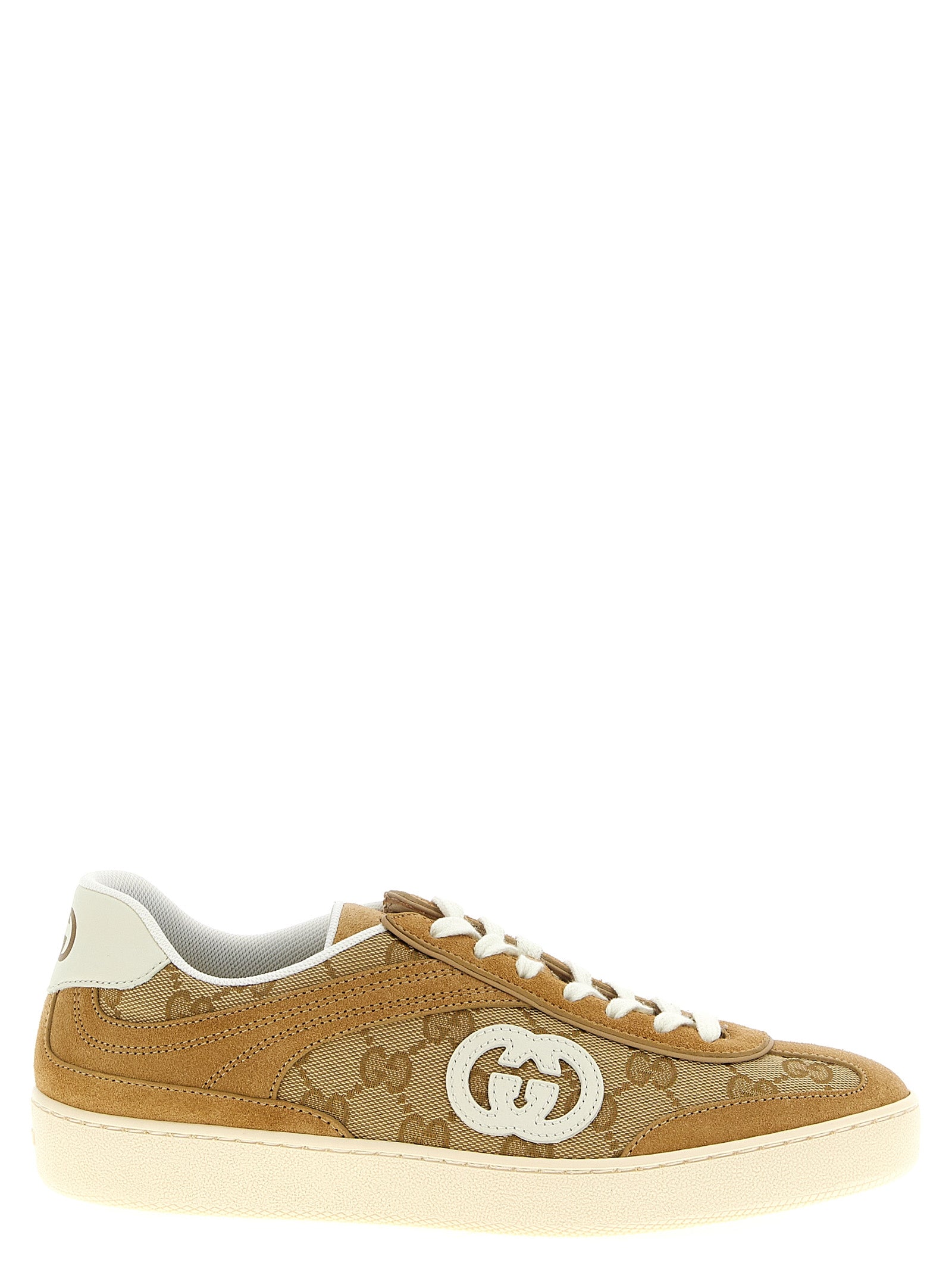 Sneakers by Gucci for women in bos taurus calfskin leather beige & signature presents a sumptuous silhouette, artfully capturing the essence of the Gg Women's Low Top Bos Taurus Calfskin Leather Sneakers with its sumptuous low-top style design.