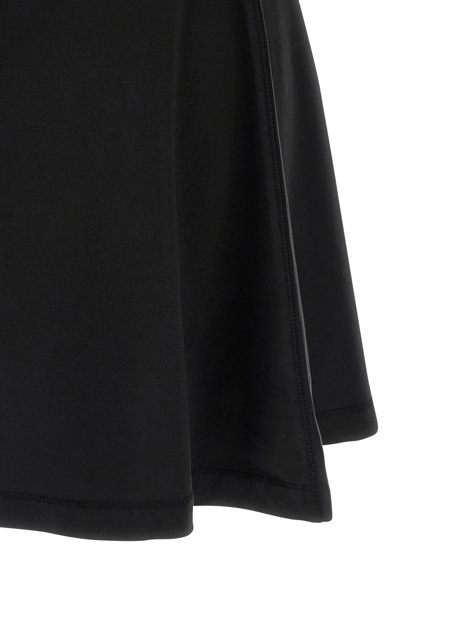 Dress by Diesel for women in stretch cotton black features a dramatic silhouette, showcasing an elegant and that flows into a dramatic short mini.