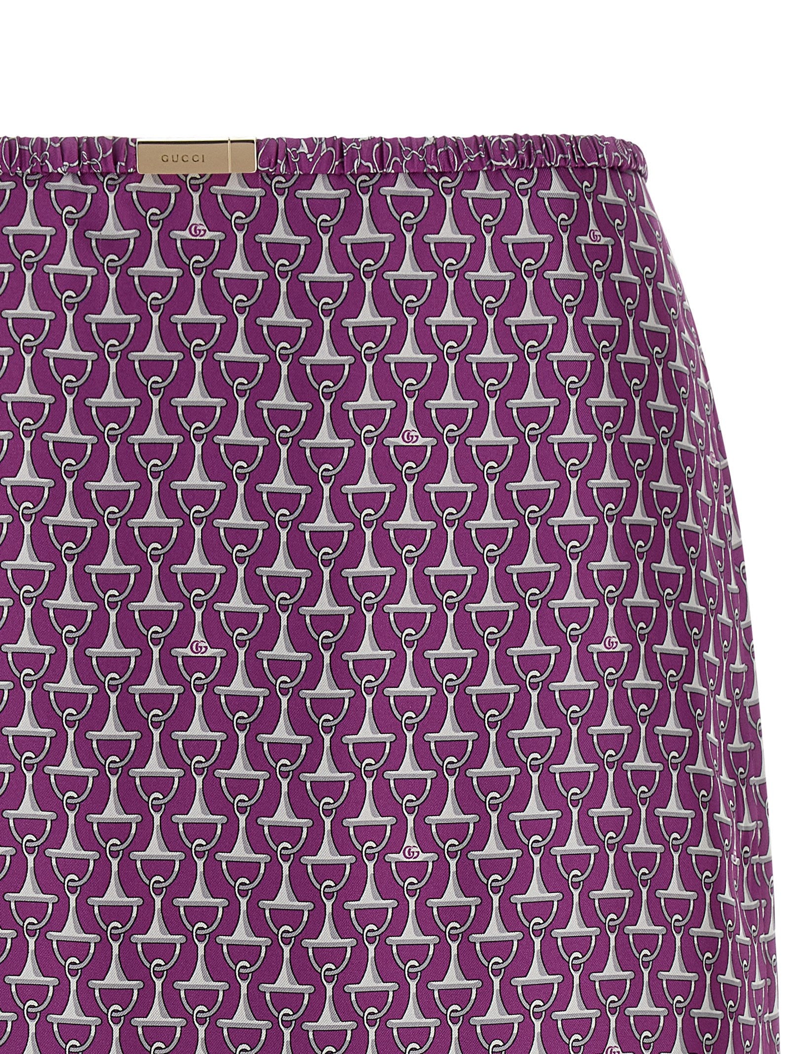 Skirt by Gucci for women in silk purple & print features an tailored silhouette, artfully capturing the essence of Women's Sheath Silk Skirt in a sophisticated midi.