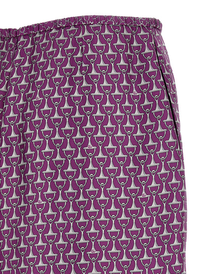 Skirt by Gucci for women in silk purple & print features a captivating silhouette, showcasing the captivating Women's Sheath Silk Skirt design with a sophisticated midi for a captivating look.