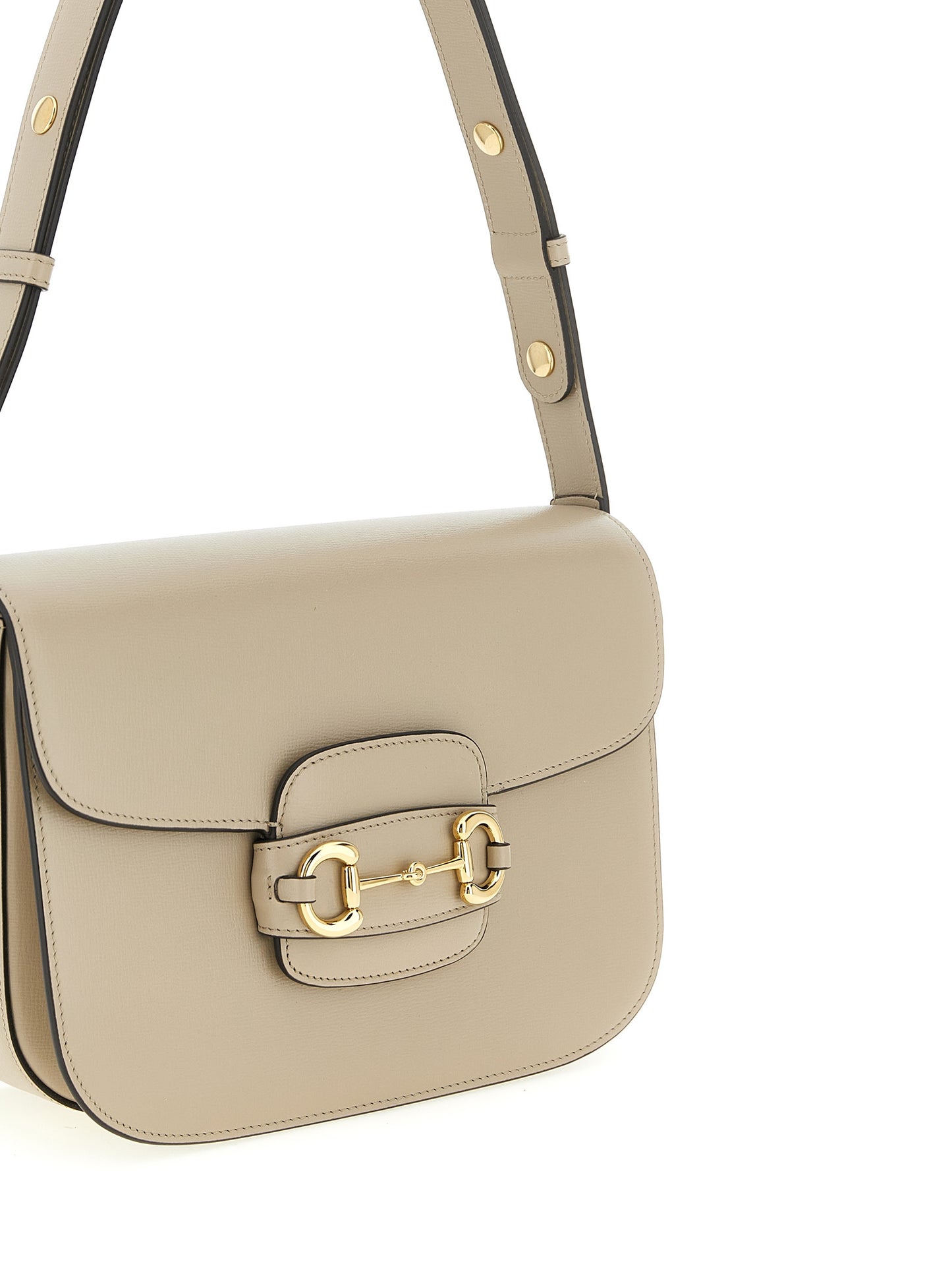 Medium Shoulder Flap Bag by Gucci for women in calfskin leather beige & signature features a enviable silhouette, showcasing a secure flap, ample , and enviable shoulder-strap & adjustable-strap for a enviable finish.