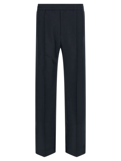 Casual Pants by Gucci for men in polyester blue features a polished silhouette with a polished straight-leg, reaching a polished long and finished with a polished .