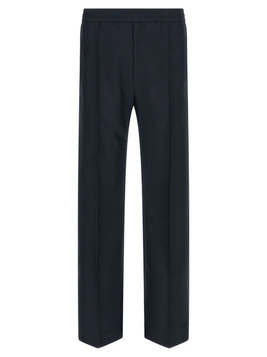 Casual Pants by Gucci for men in polyester blue features a polished silhouette with a polished straight-leg, reaching a polished long and finished with a polished .