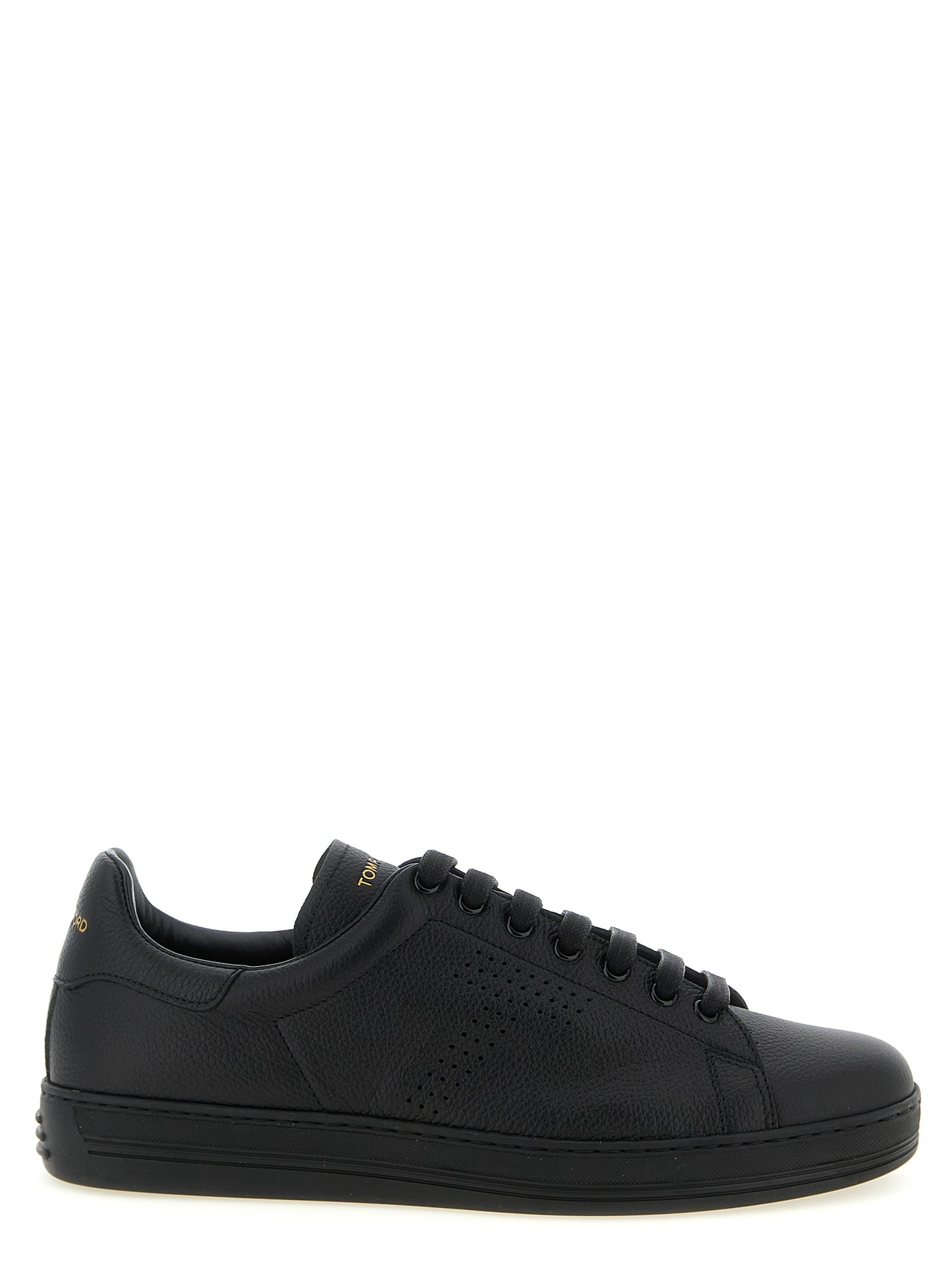 Sneakers by Tom Ford for men in leather & brass black presents a sumptuous silhouette, artfully capturing the essence of the Men's Low Top Leather & Brass Sneakers with its sumptuous low-top style design.