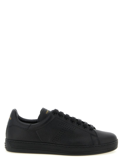 Sneakers by Tom Ford for men in leather & brass black presents a sumptuous silhouette, artfully capturing the essence of the Men's Low Top Leather & Brass Sneakers with its sumptuous low-top style design.