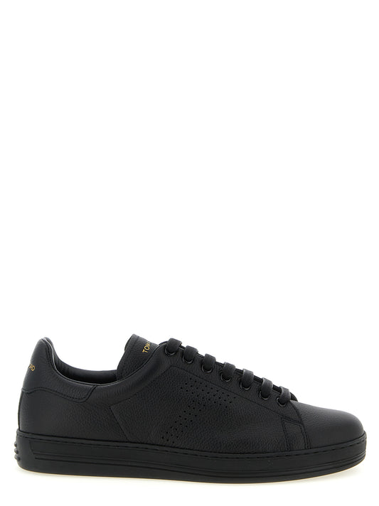 Sneakers by Tom Ford for men in leather & brass black presents a sumptuous silhouette, artfully capturing the essence of the Men's Low Top Leather & Brass Sneakers with its sumptuous low-top style design.