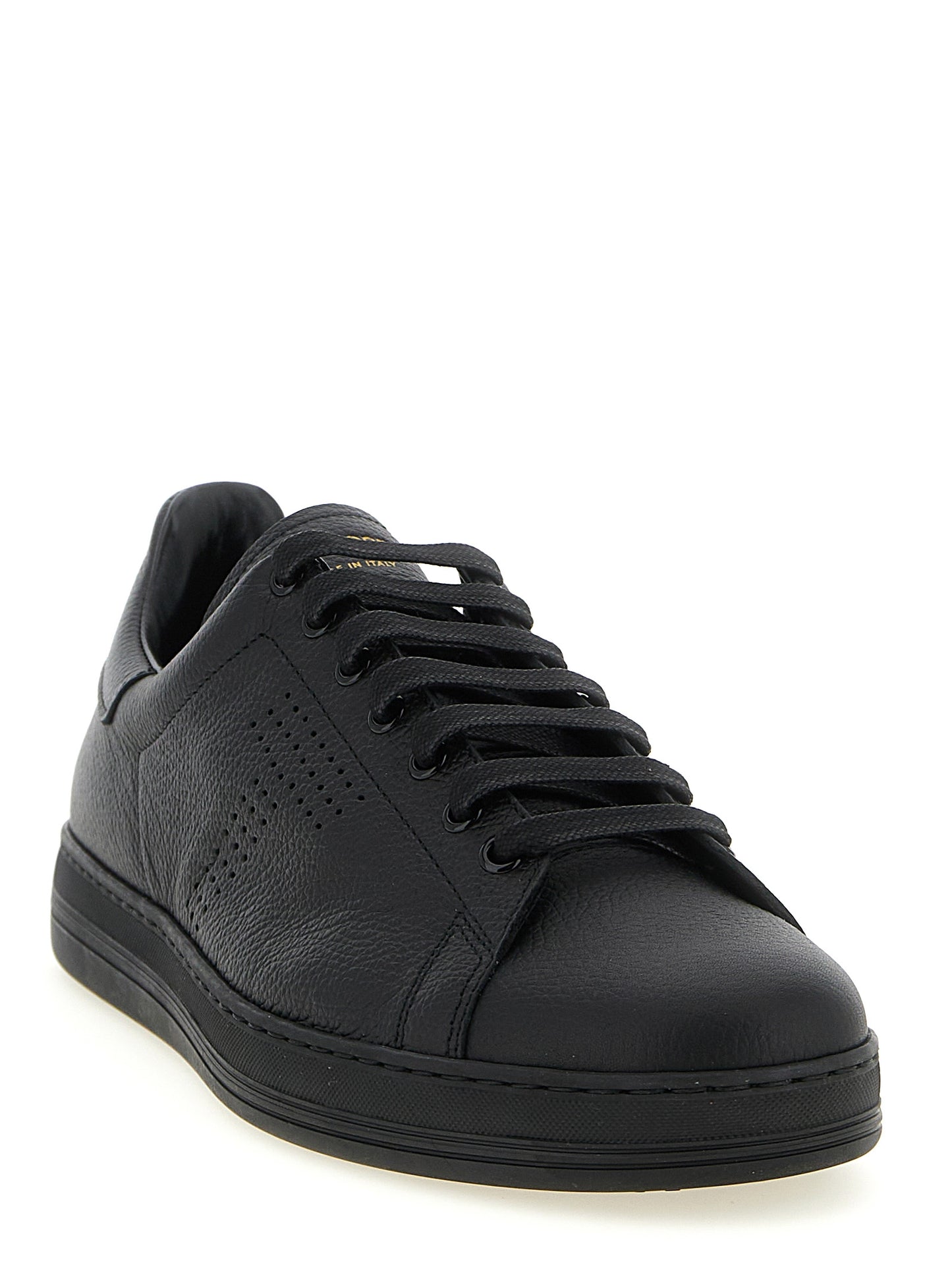 Sneakers by Tom Ford for men in leather & brass black presents a impeccable silhouette as Men's Low Top Leather & Brass Sneakers, expertly defined by a impeccable low-top style for a impeccable, high-fashion look.