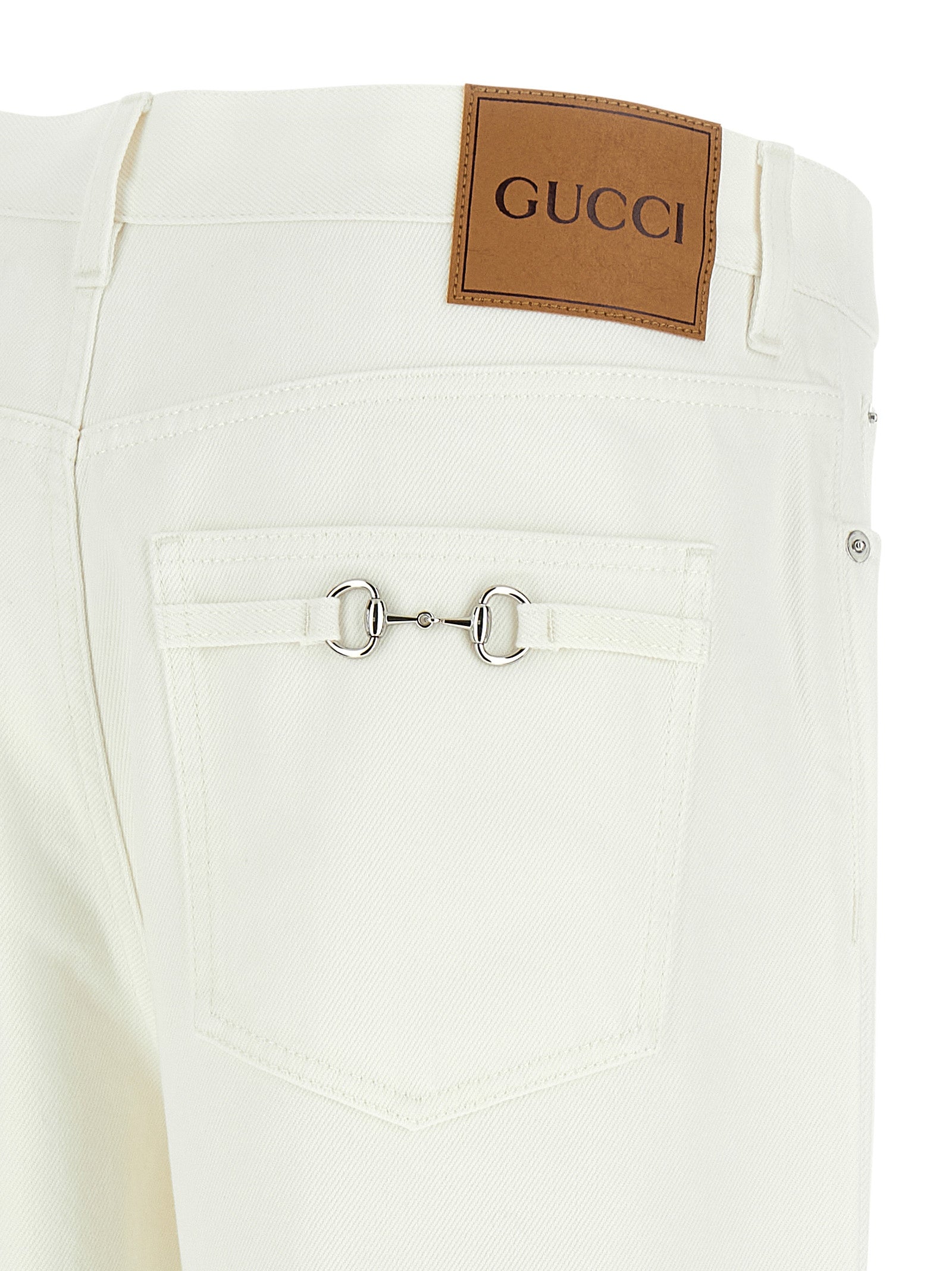 Jeans by Gucci for men in denim cotton canvas white features an refined tailoring silhouette, showcasing a premium straight-leg & wide with a mid rise and long cut for a refined tailoring look.