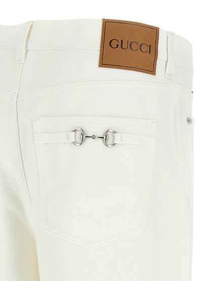 Jeans by Gucci for men in denim cotton canvas white features an refined tailoring silhouette, showcasing a premium straight-leg & wide with a mid rise and long cut for a refined tailoring look.