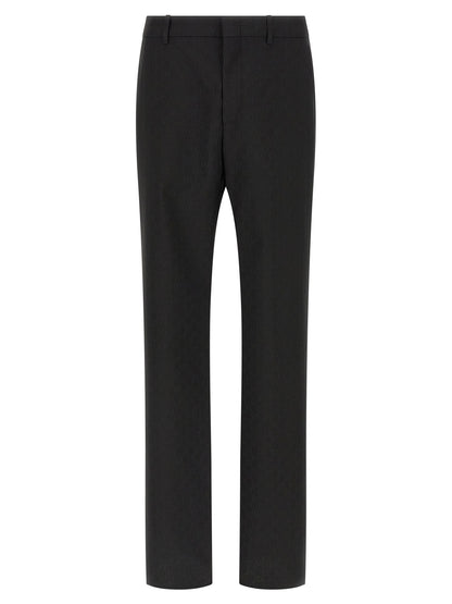 Trousers by Gucci for men in wool & polyester black & patterned presents a smart silhouette, meticulously detailed with a smart straight-leg & regular-fit, a smart long, and a smart .