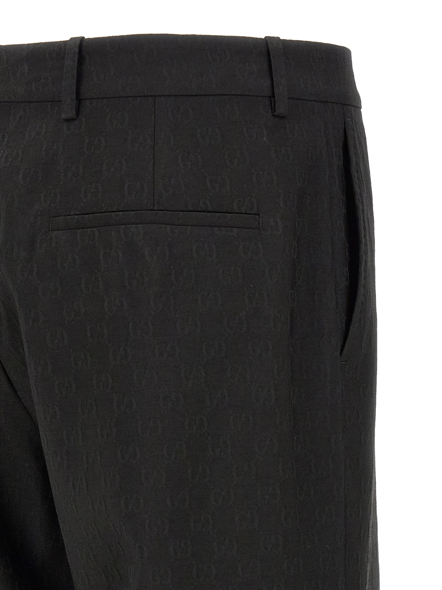 Trousers by Gucci for men in wool & polyester black & patterned presents a perennial silhouette, meticulously tailored with a straight-leg & regular-fit cut, long finish, and an elegant .