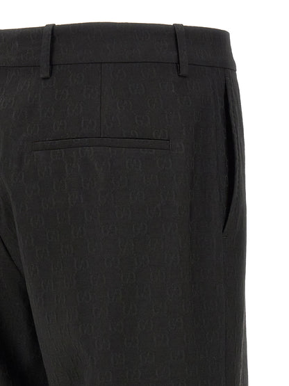 Trousers by Gucci for men in wool & polyester black & patterned presents a perennial silhouette, meticulously tailored with a straight-leg & regular-fit cut, long finish, and an elegant .