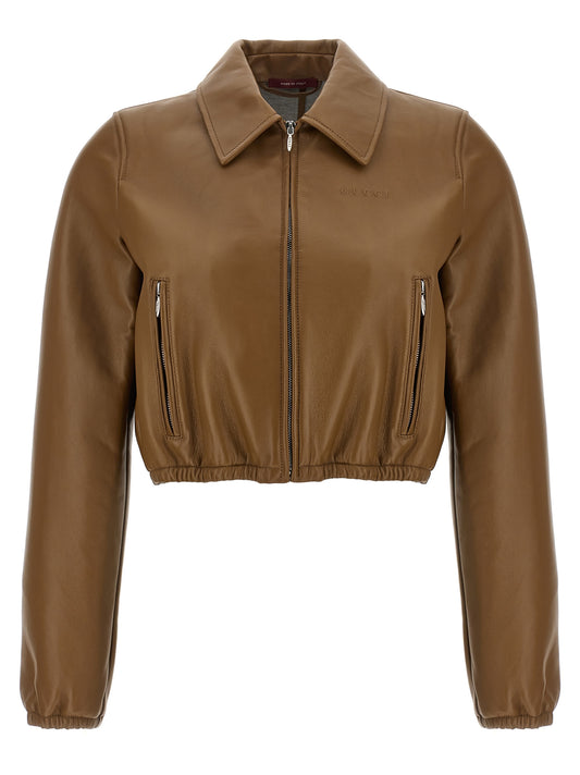 This Jacket by Gucci for women in lamb leather beige showcases a magnificent silhouette, meticulously crafted with a distinctive and functional pockets for a magnificent finish.