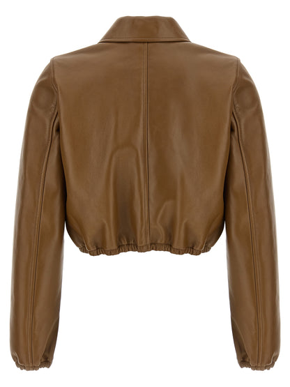 Jacket by Gucci for women in lamb leather beige showcases a contemporary silhouette, detailed with a contemporary and premium pockets for a sophisticated finish.