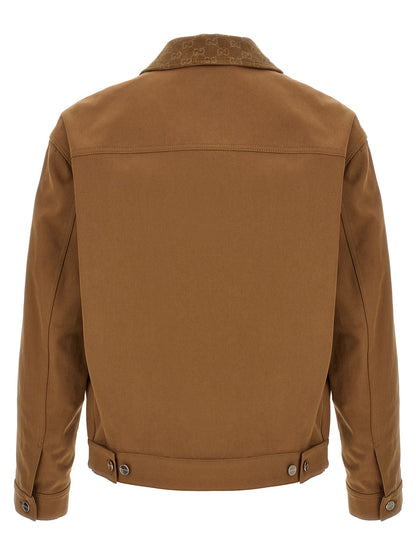 Overcoat by Gucci for men in cotton corduroy & canvas brown showcases a enveloping silhouette, detailed with distinctive pockets and a enveloping shirt-collar neckline.
