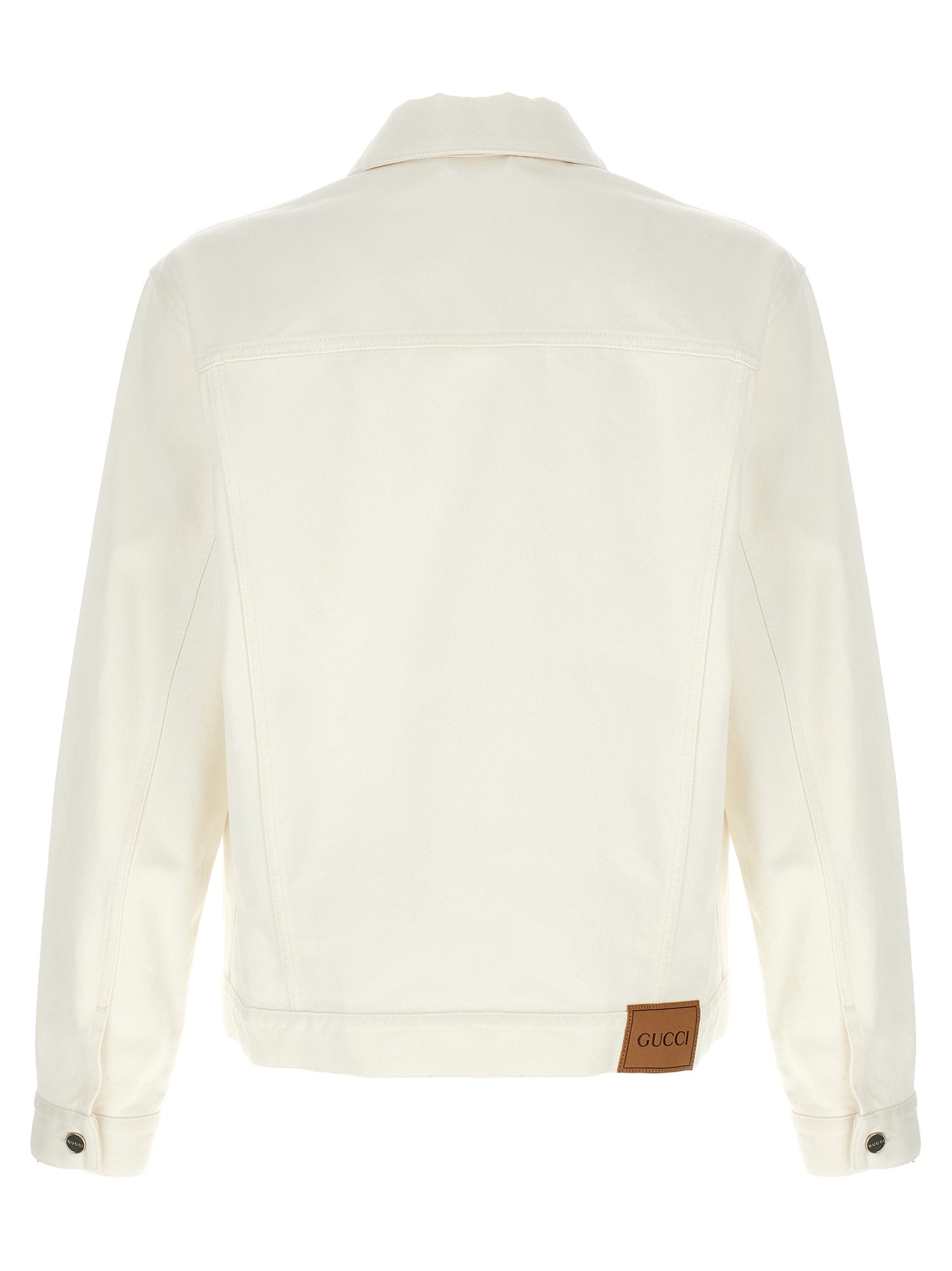 Trucker Jacket by Gucci for men in denim cotton white features a city-ready silhouette, detailed with pockets and a city-ready shirt-collar neckline.