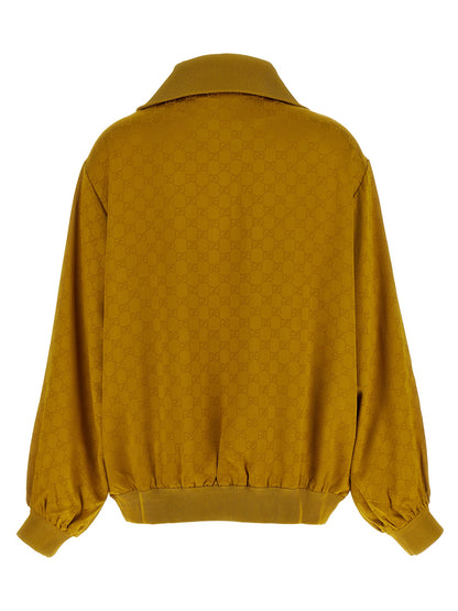Cardigan by Gucci for women in acetate & viscose bicolour, yellow, patterned & jacquard showcases a captivating silhouette, artfully detailed with a captivating and for a truly sophisticated captivating look.