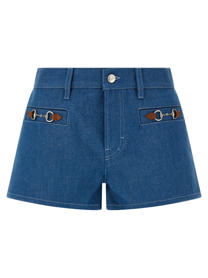 Denim Shorts by Gucci for women in denim cotton blue features an utilitarian chic with a short and , creating a utilitarian chic silhouette perfect for elevated casual styling.