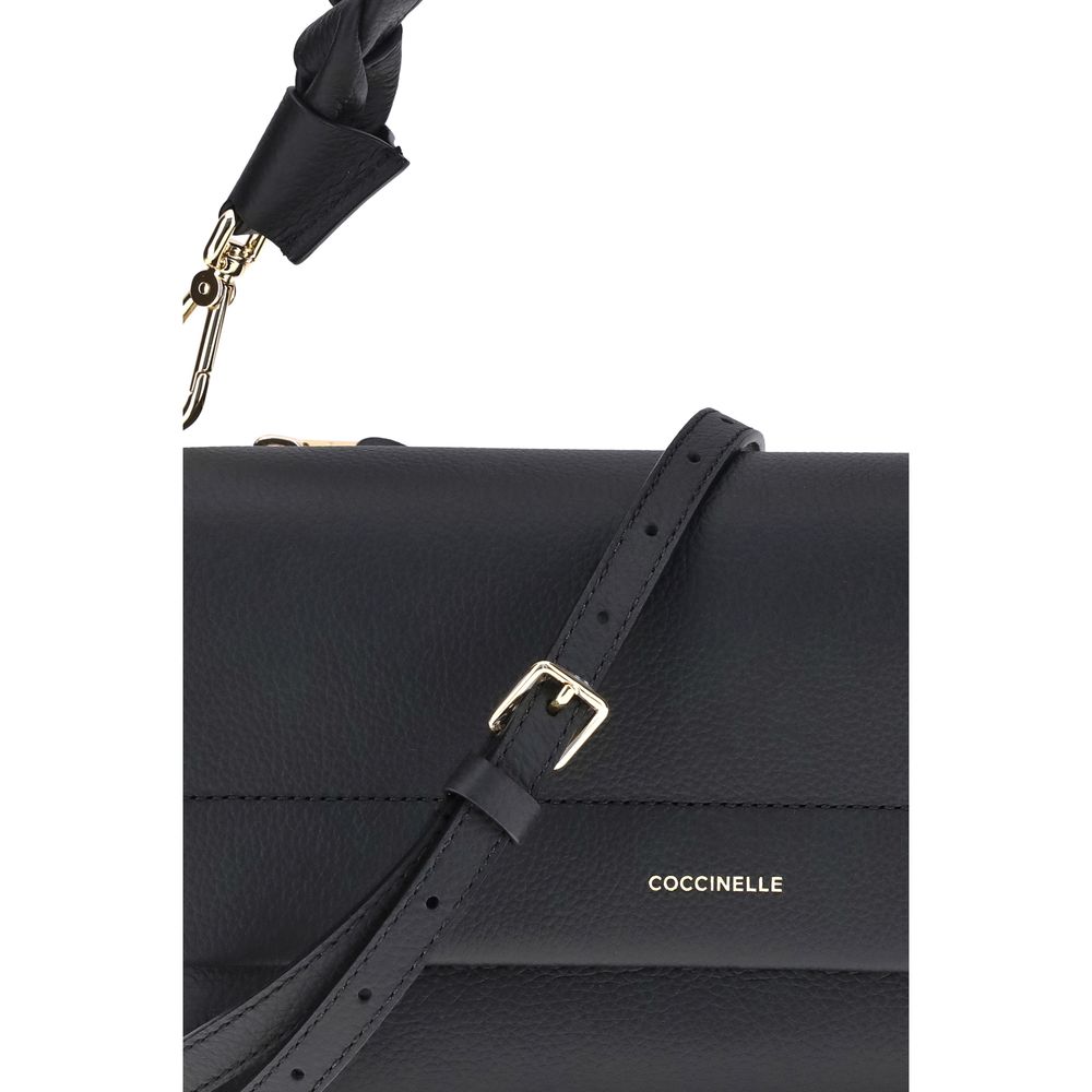2-in-1 Shoulder & Crossbody Flap Bag by Coccinelle for women in bos taurus calf leather black features an effortlessly chic silhouette with a secure flap, zipper & magnetic, ample external-pockets, and versatile crossbody-strap, shoulder-strap, adjustable-strap & handle for effortlessly chic everyday luxury.
