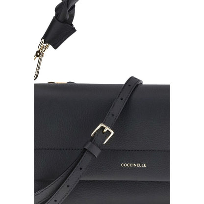 2-in-1 Shoulder & Crossbody Flap Bag by Coccinelle for women in bos taurus calf leather black features an effortlessly chic silhouette with a secure flap, zipper & magnetic, ample external-pockets, and versatile crossbody-strap, shoulder-strap, adjustable-strap & handle for effortlessly chic everyday luxury.