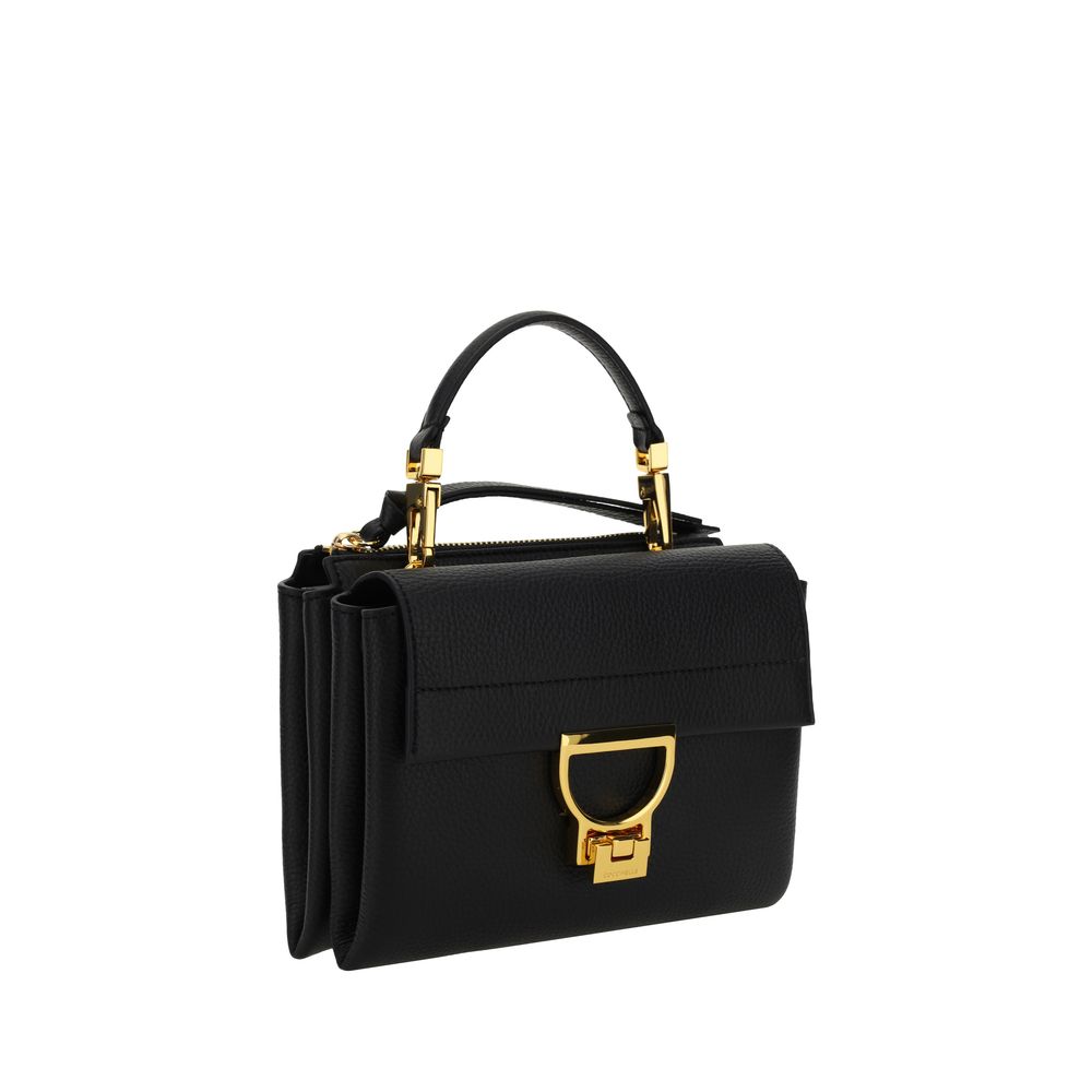 Flap Shoulder Bag by Coccinelle for women in bos taurus calfskin leather black, gold, signature & monogram features a effortless sophistication silhouette, secured by a flap & zipper with ample and versatile shoulder-strap, handle & adjustable-strap for a effortless sophistication finish.