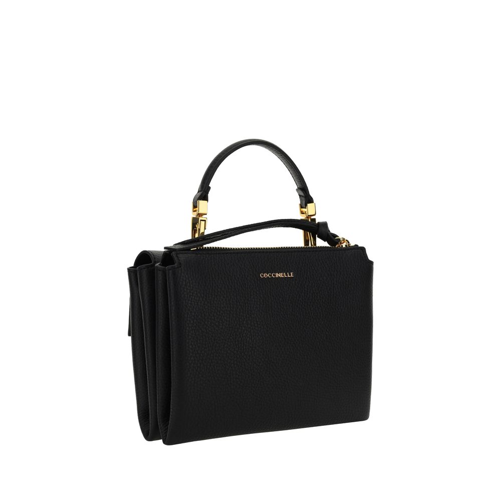 Flap Shoulder Bag by Coccinelle for women in bos taurus calfskin leather black, gold, signature & monogram presents a versatile silhouette, showcasing a secure flap & zipper and versatile with versatile shoulder-strap, handle & adjustable-strap for a sophisticated look.