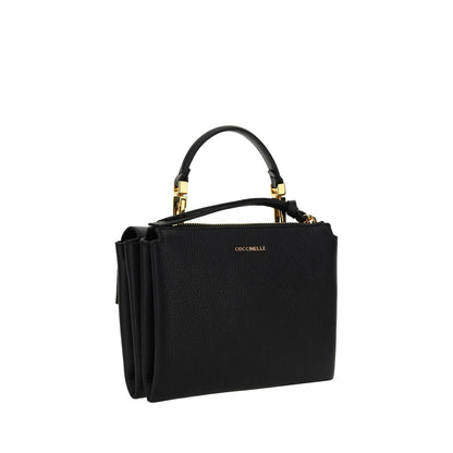 Flap Shoulder Bag by Coccinelle for women in bos taurus calfskin leather black, gold, signature & monogram presents a versatile silhouette, showcasing a secure flap & zipper and versatile with versatile shoulder-strap, handle & adjustable-strap for a sophisticated look.