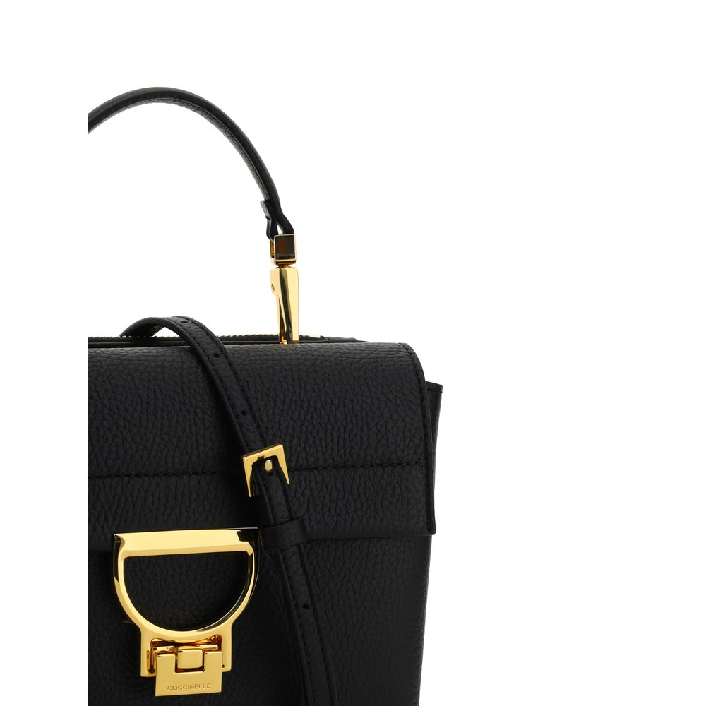 Flap Shoulder Bag by Coccinelle for women in bos taurus calfskin leather black, gold, signature & monogram features a distinguished silhouette, showcasing a secure flap & zipper and distinguished with versatile shoulder-strap, handle & adjustable-strap for a distinguished finish.