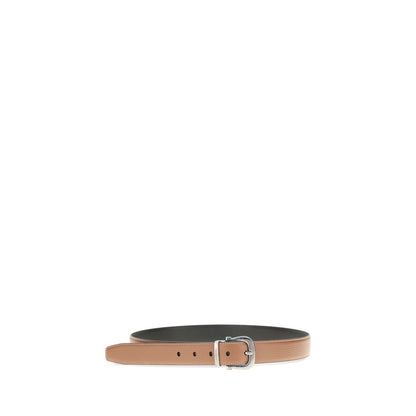 Belt by Ferragamo for men in bos taurus calfskin leather brown presents a artisanal silhouette from the Gancini Bos Taurus Calfskin Leather Belt collection, showcasing an artisanal design and refined craftsmanship for a artisanal look.