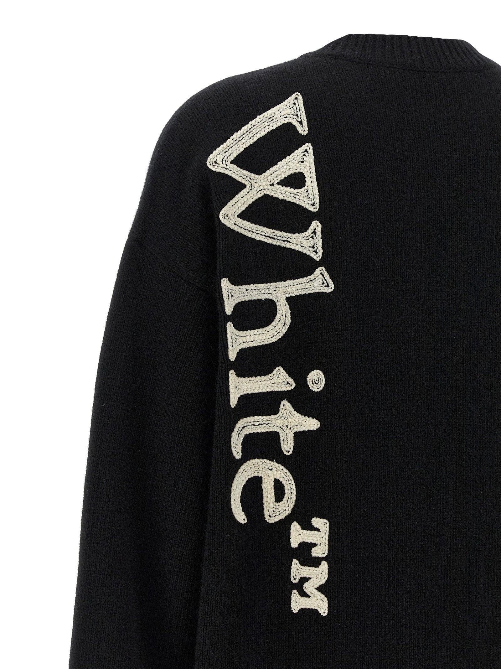 Cardigan by Off-White for women in polyamide wool bicolour, black & white presents a textural silhouette, artfully finished with a textural and for a sophisticated, textural look.