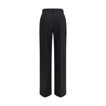 Trousers by Rick Owens for women in wool black presents a smart silhouette, meticulously detailed with a smart regular-fit & wide, a smart long, and a smart .