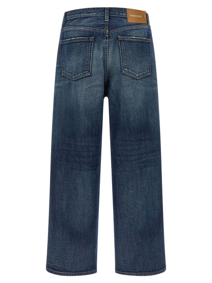 Jeans by Haikure for women in denim cotton blue features a polished silhouette with a polished wide, reaching a polished long and finished with a polished .