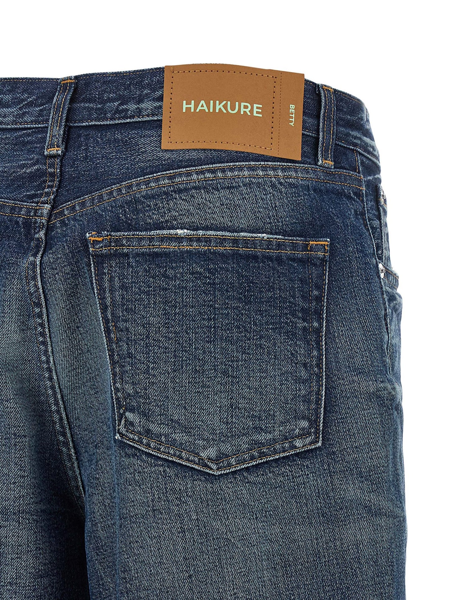 Jeans by Haikure for women in denim cotton blue presents a tailored silhouette, showcasing a tailored wide and long cut with a refined for a truly tailored aesthetic.