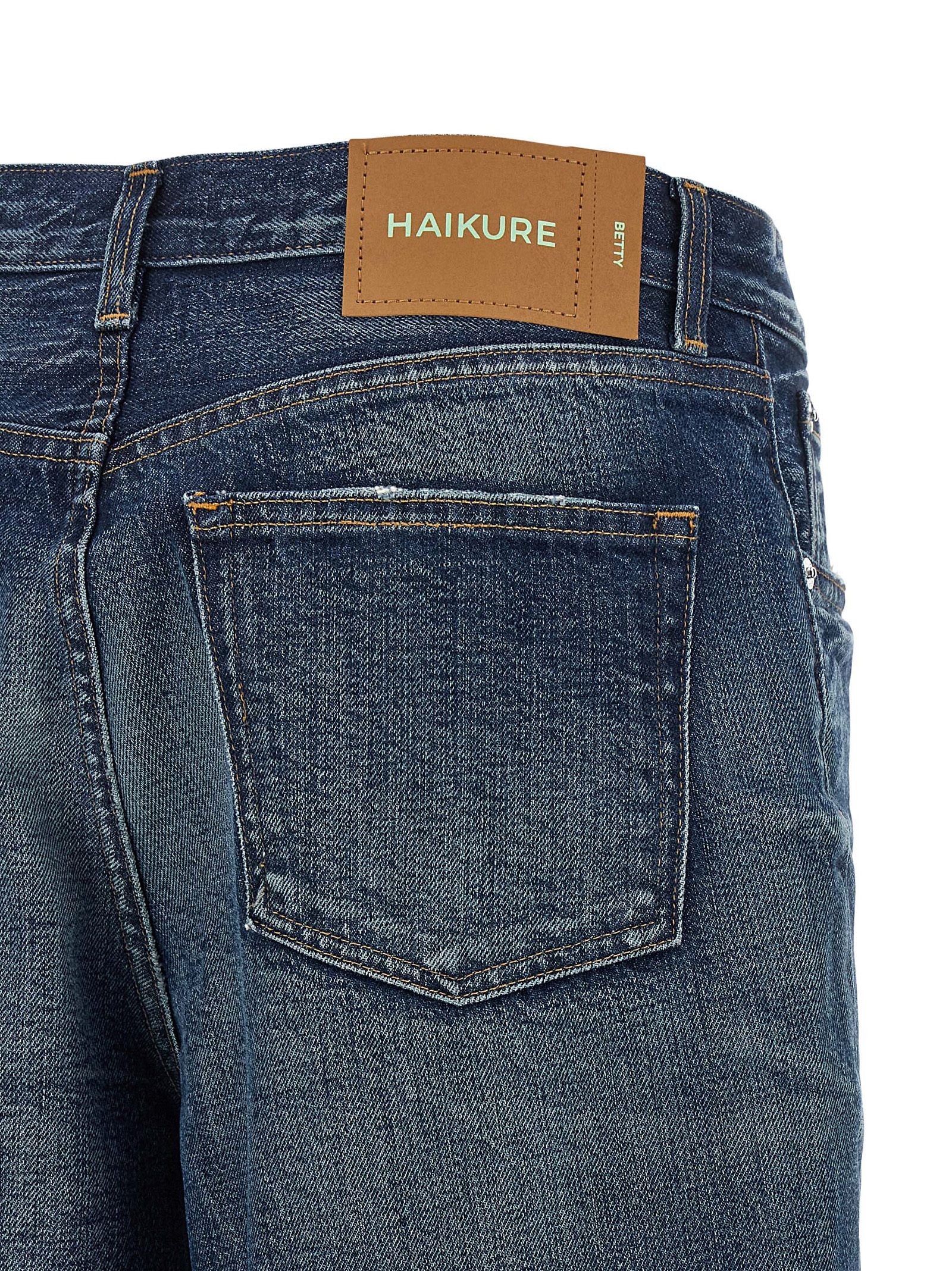Jeans by Haikure for women in denim cotton blue presents a tailored silhouette, showcasing a tailored wide and long cut with a refined for a truly tailored aesthetic.