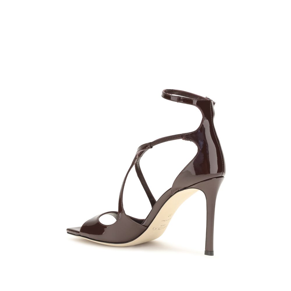 Stiletto Ankle Strap Sandals by Jimmy Choo for women in bos taurus calf patent leather brown features an exquisite silhouette, showcasing the exquisite Women's Bos Taurus Calf Patent Leather Stiletto Ankle Strap Sandals with a stiletto and open toe style.