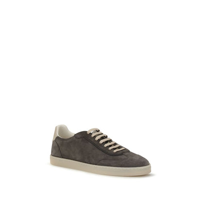 Sneakers by Brunello Cucinelli for men in bos taurus suede calf leather gray & natural presents a sumptuous silhouette, artfully capturing the essence of the Men's Low Top Bos Taurus Suede Calf Leather Sneakers with its sumptuous low-top style design.