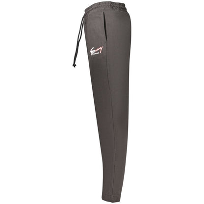 Joggers by Tommy Hilfiger for men in cotton black, signature & print features an refined tailoring silhouette, showcasing a premium with a and long cut for a refined tailoring look.