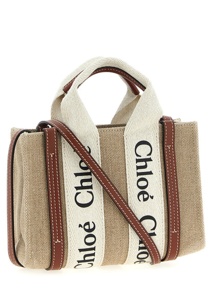Mini Shoulder Tote Handbag by Chloé for women in canvas & calfskin leather multicolor features a refined silhouette, showcasing a secure , organized , and versatile shoulder-strap & handle for a refined finish.