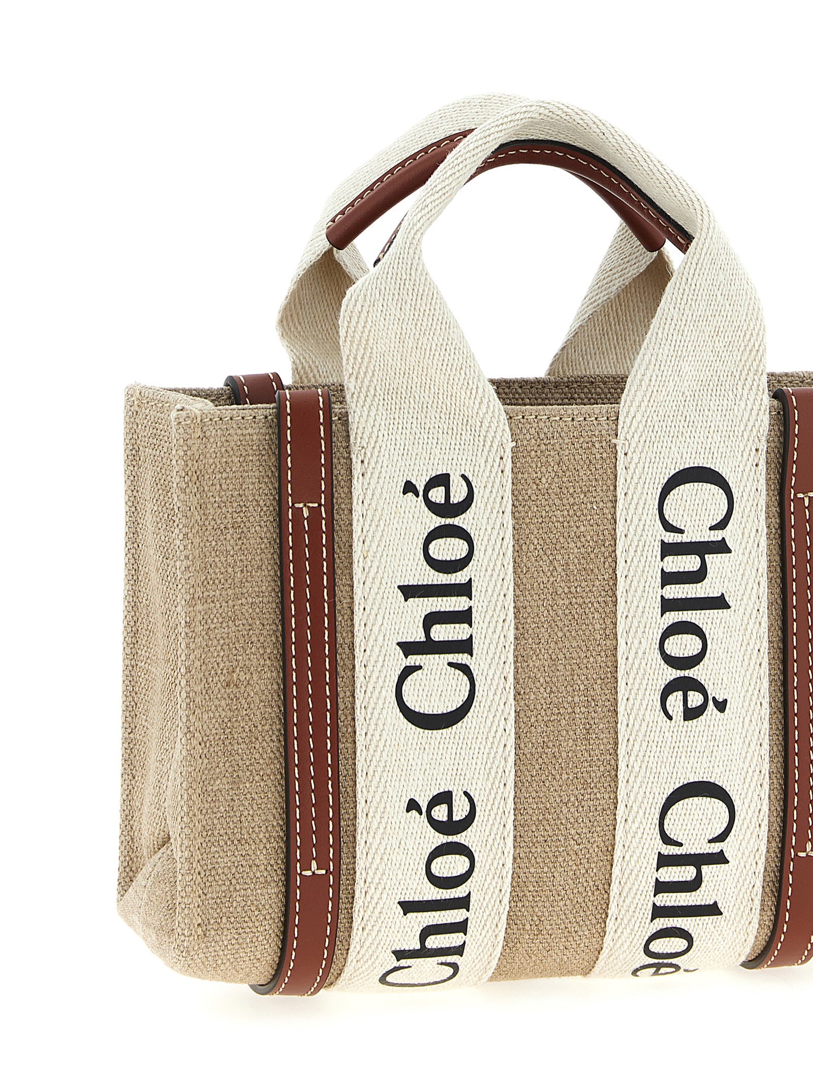 Mini Shoulder Tote Handbag by Chloé for women in canvas & calfskin leather multicolor features a contemporary silhouette, showcasing a secure , ample , and contemporary shoulder-strap & handle for a sophisticated look.