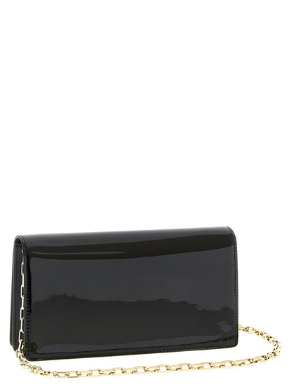 Shoulder Evening Flap Clutch Handbag by Christian Louboutin for women in calfskin leather black features a sculptural silhouette with a secure flap & magnetic, organized , and versatile shoulder-strap for a sculptural finish.