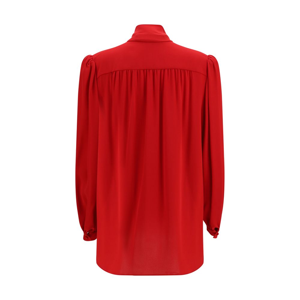 Blouse by Valentino Garavani for women in silk multicolor features an architectural silhouette with a refined and elegant v-neck shawl-collar neckline for a architectural look.