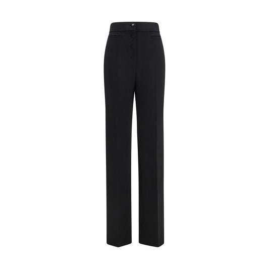 Trousers by Valentino Garavani for women in wool black presents a perennial silhouette, meticulously tailored with a flared & regular-fit cut, long finish, and an elegant .