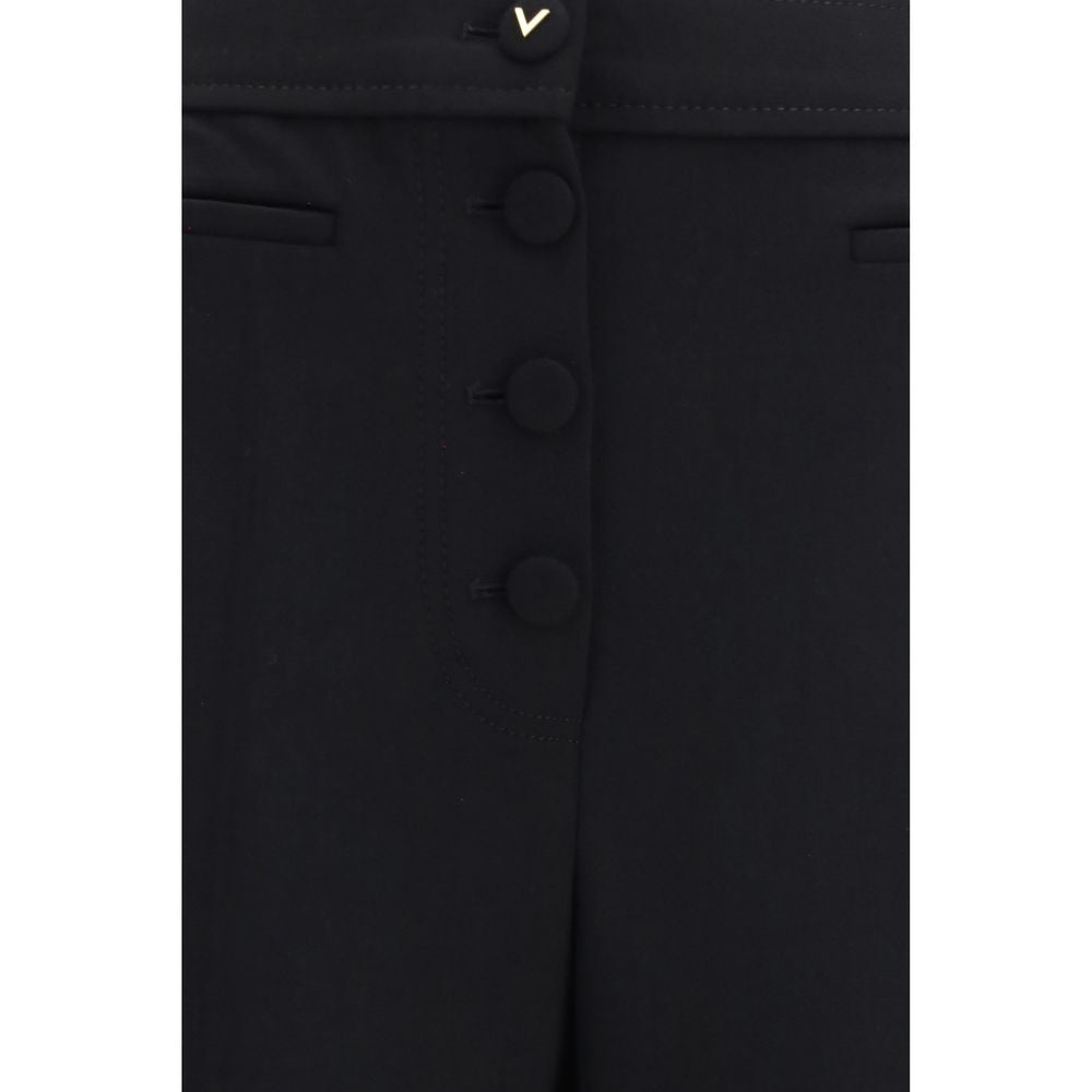 Trousers by Valentino Garavani for women in wool black features a sculptural silhouette, showcasing a sculptural flared & regular-fit and long with a sophisticated for a sculptural finish.