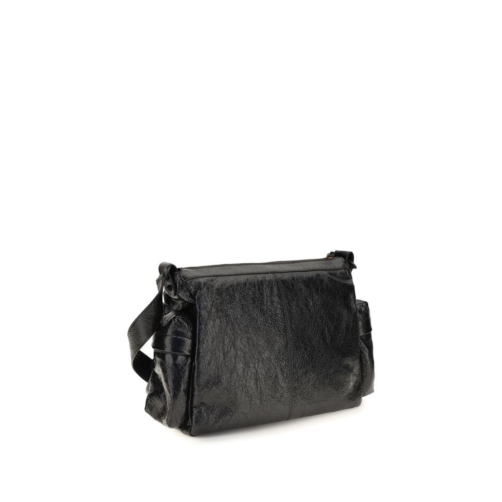Medium 2-in-1 Shoulder & Crossbody Bag by Balenciaga for men in zamak cotton canvas calf & lambskin leather black & signature presents a versatile silhouette, showcasing a secure zipper and versatile with versatile crossbody-strap, shoulder-strap & adjustable-strap for a sophisticated look.