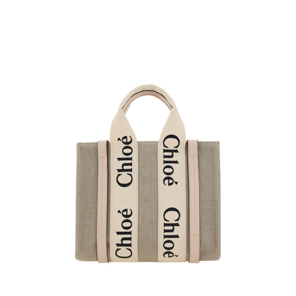 Tote Handbag by Chloé for women in linen & leather brown, monogram & print presents a ornamental silhouette, showcasing a secure , ample internal-pockets, and versatile shoulder-strap, handle & adjustable-strap for a ornamental finish.