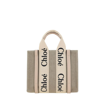 Tote Handbag by Chloé for women in linen & leather brown, monogram & print presents a ornamental silhouette, showcasing a secure , ample internal-pockets, and versatile shoulder-strap, handle & adjustable-strap for a ornamental finish.