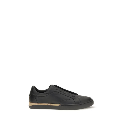 Sneakers by Fendi for men in bos taurus calf leather black, brown & white presents a sumptuous silhouette, artfully capturing the essence of the City Selleria Men's Slip On Bos Taurus Calf Leather Sneakers with its sumptuous slip-on style design.