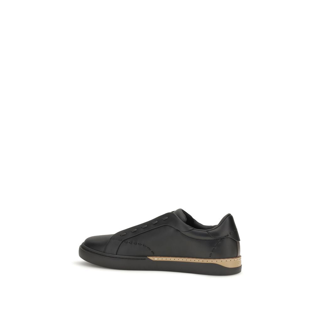 Sneakers by Fendi for men in bos taurus calf leather black, brown & white features a chic design, perfectly showcasing the chic slip-on style of this City Selleria Men's Slip On Bos Taurus Calf Leather Sneakers.