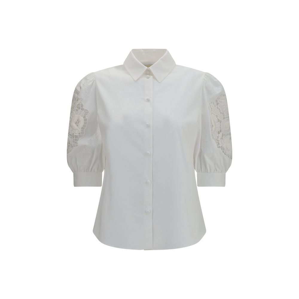 Blouse by Valentino Garavani for women in cotton white showcases a sleek silhouette, elegantly detailed with a sleek and for a sleek finish.